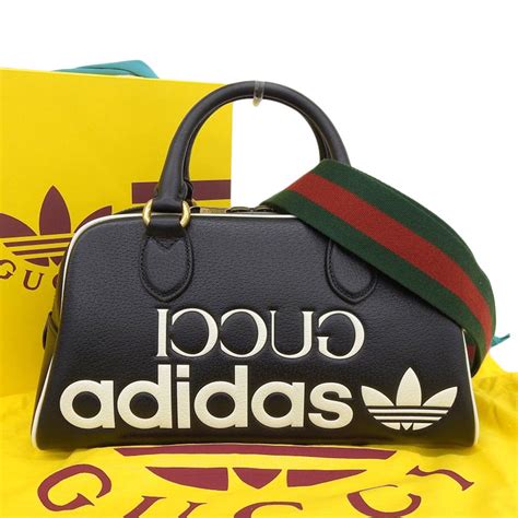 collaboration adidas gucci|gucci adidas collaboration purse.